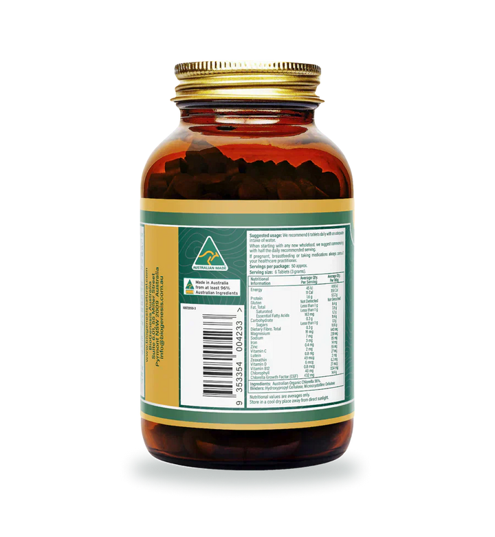 Organic Chlorella Tablets in amber glass bottle with label.